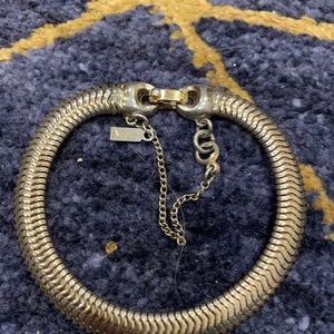 Vintage Monet Shiny Gold Tone Snake Chain Bracelet. Approx. 2 1/4” Diam Closed